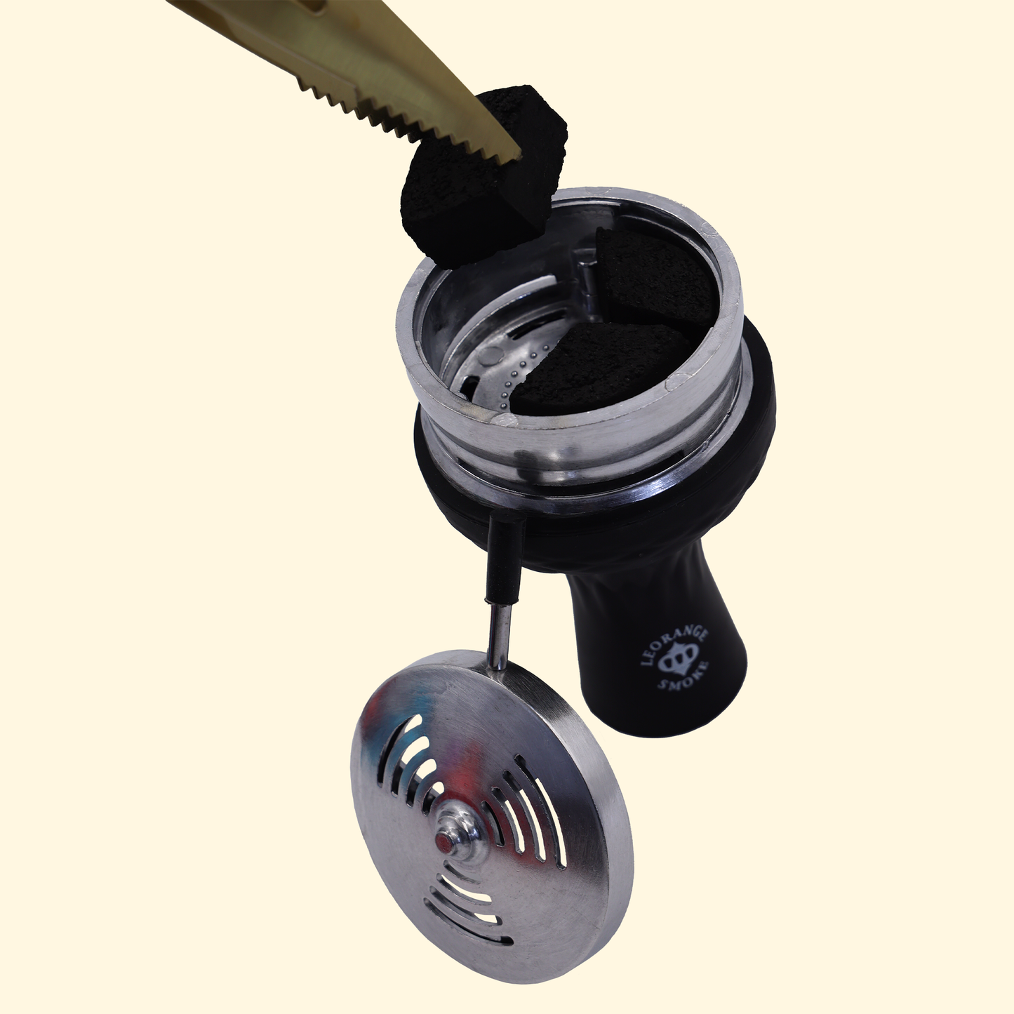 Lotus charcoal being placed over HMD